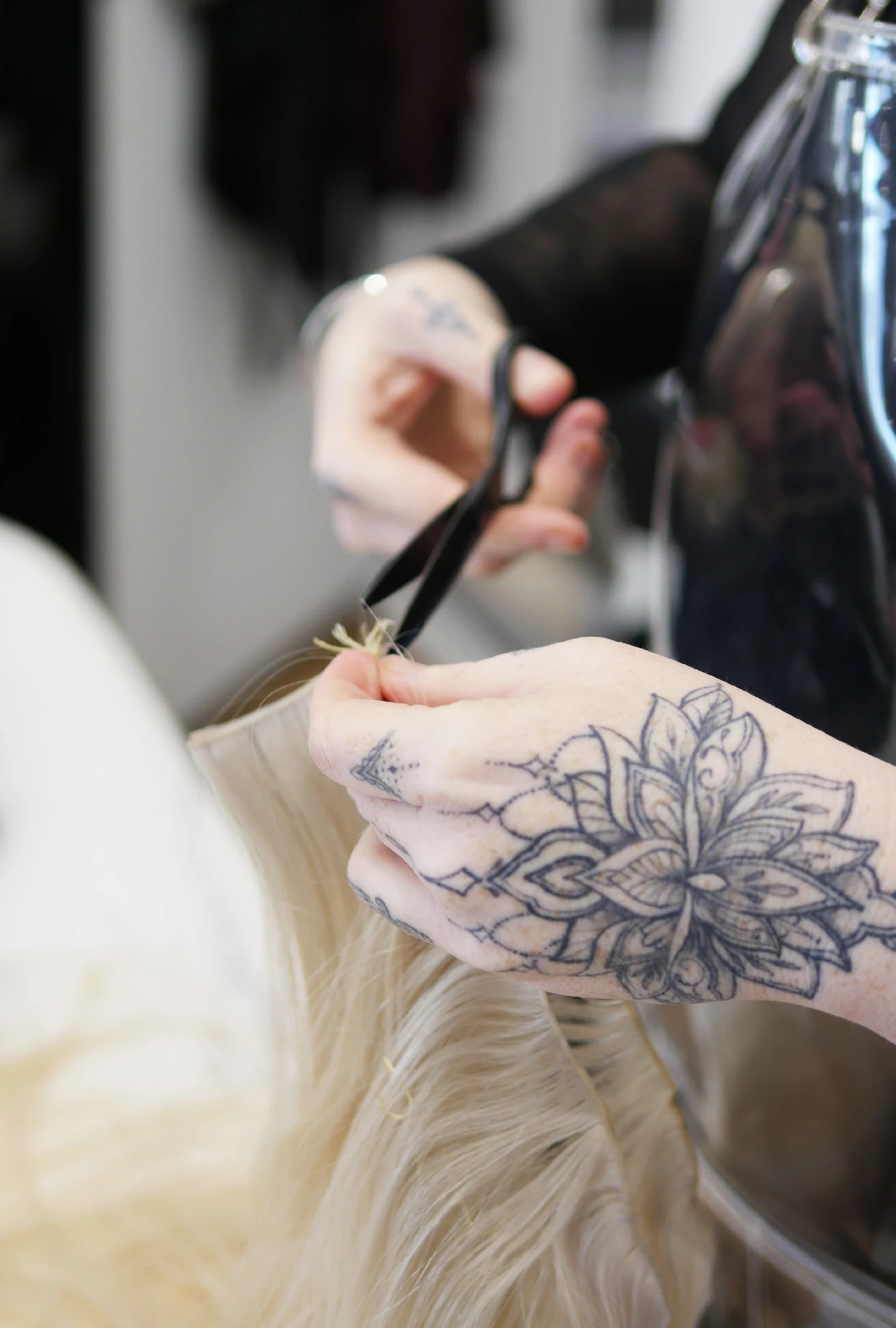Premium blonde hair extensions being prepared