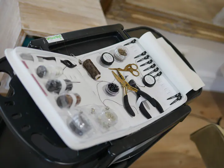 Professional extension tools prepared for a salon appointment