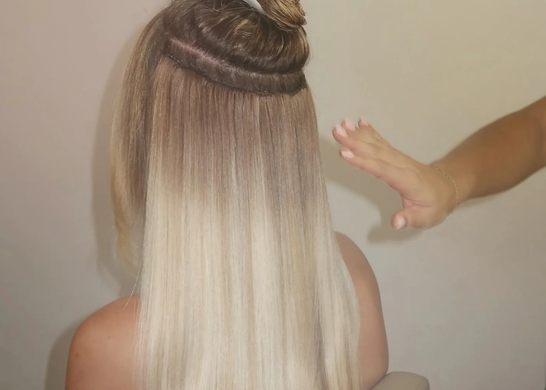 Hair extension maintenance in the studio